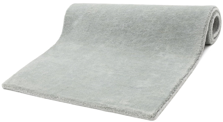 Light Grey Modern wool area rug rolled view