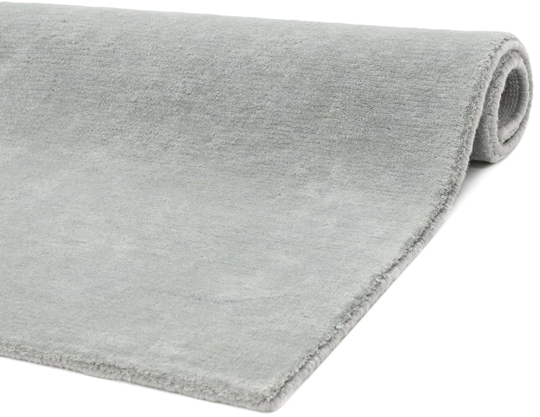 Light Grey Modern wool area rug close angled view