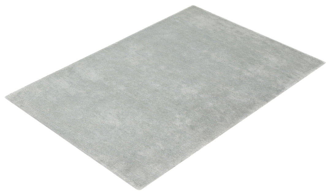 Light Grey Modern wool area rug angled full view