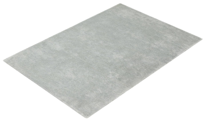 Light Grey Modern wool area rug angled full view